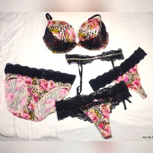 VS 5 piece set. Leopard/floral print push up bra size 34DD. Garter belt, 3 pnty